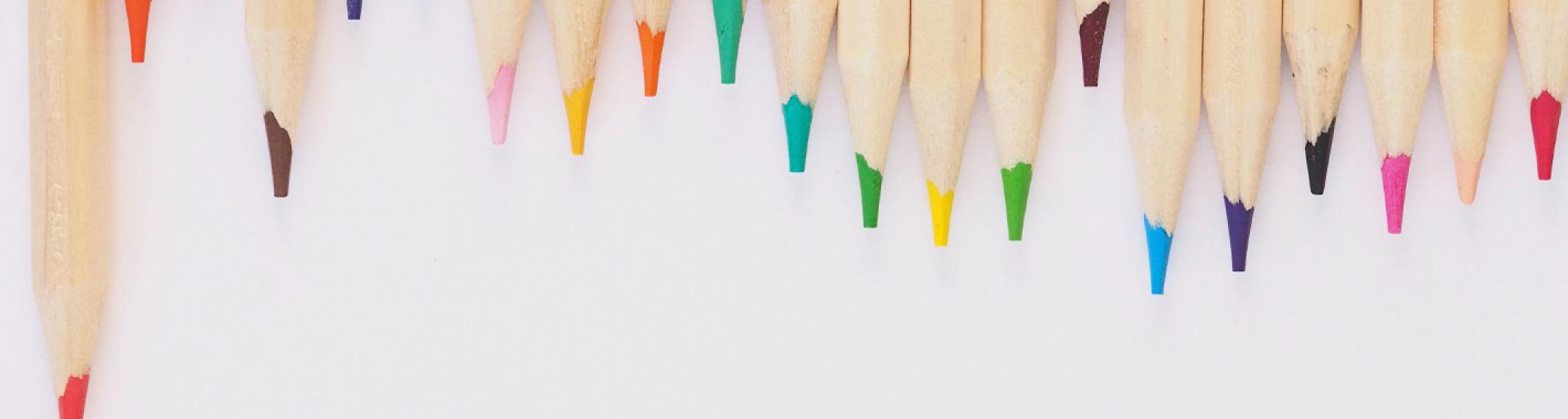 Closeup of sharpened pencil tips in various colors