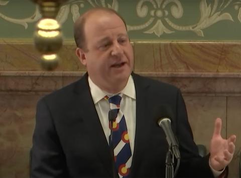 Wearing a tie representing the Colorado state flag, Governor Jared Polis delivers his 2024 State of the State Address 