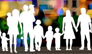 photo illustration of white silhouettes of people of various ages against a colorful streetscape background